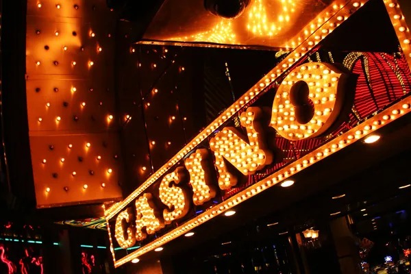 Mega Moolah slot game interface showing five reels, paylines, and progressive jackpot meter